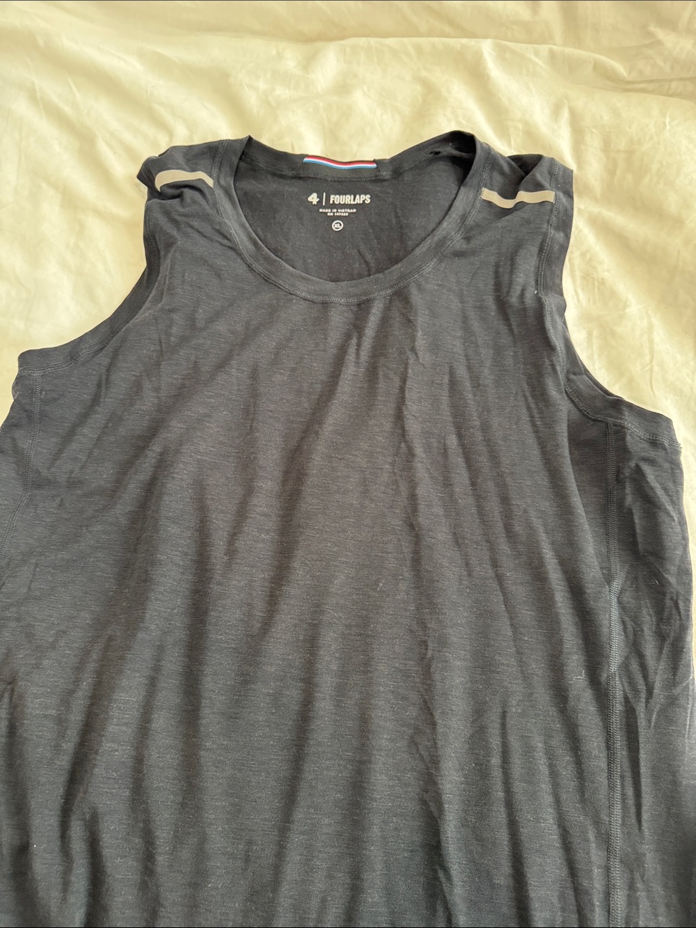 Four laps Men’s Black Performance Tank with Subtle Hem Print